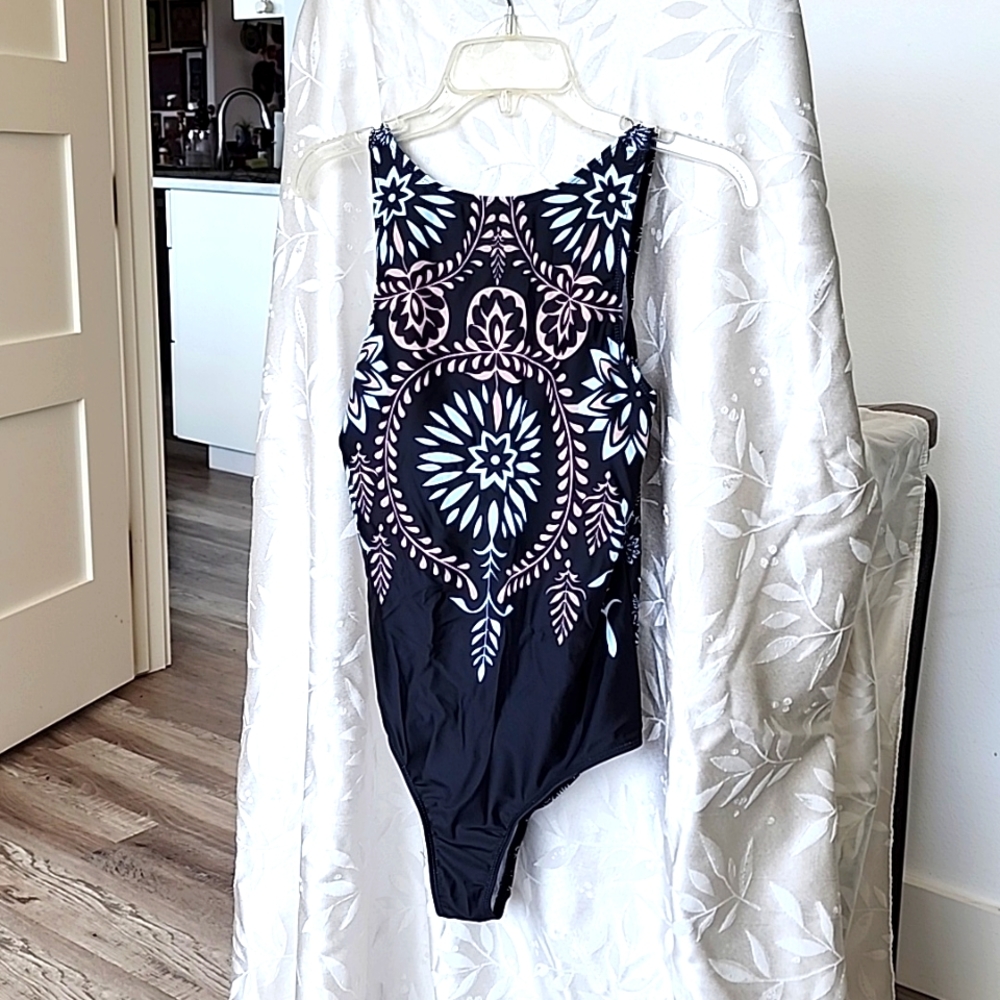 One piece swimsuit.